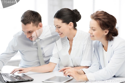 Image of business team working in office