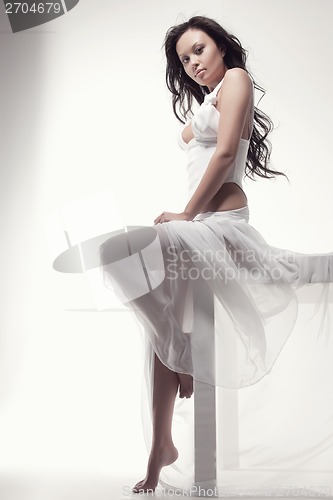 Image of gorgeous asian woman in white dress