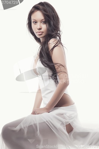 Image of gorgeous asian woman in white dress