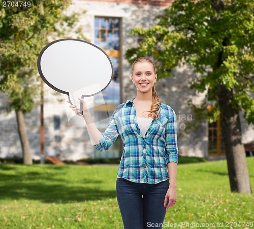 Image of smiling young woman with blank text bubble