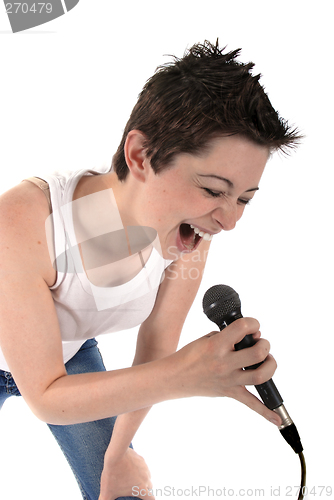 Image of Woman singing into a microphone