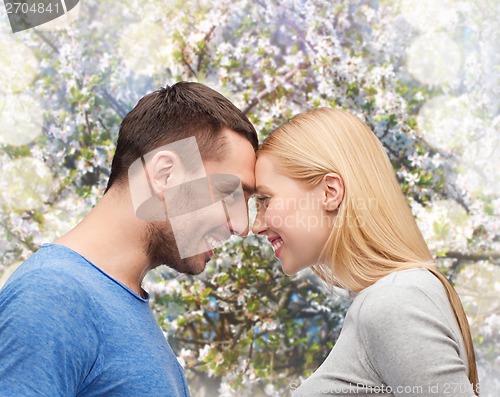 Image of smiling couple looking at each other