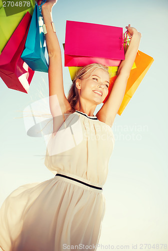 Image of woman with shopping bags