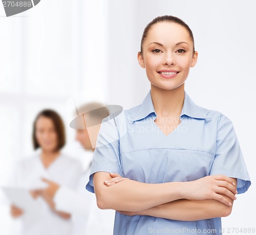 Image of smiling female doctor or nurse