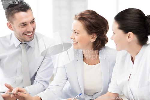 Image of business team having discussion in office