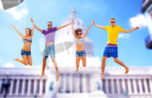 Image of group of friends or couples jumping