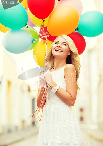 Image of woman with colorful balloons