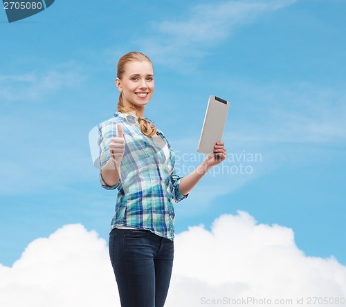 Image of smiling girl with tablet pc computer