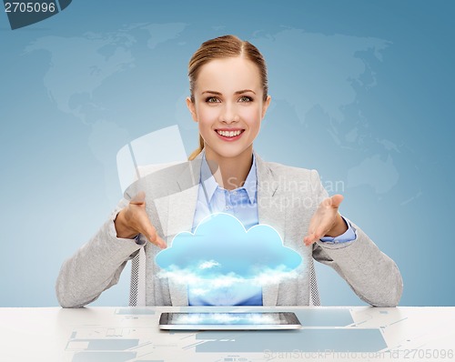 Image of smiling businesswoman with tablet pc