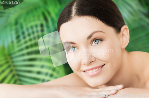 Image of smiling woman in spa salon