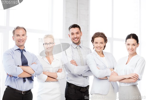 Image of happy business team in office
