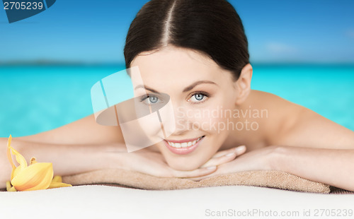 Image of smiling woman in spa salon