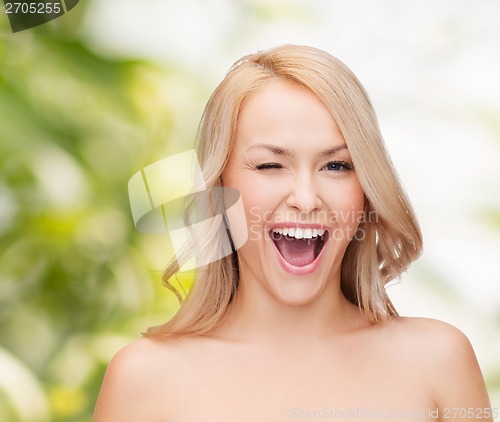 Image of beautiful woman with long wavy hair