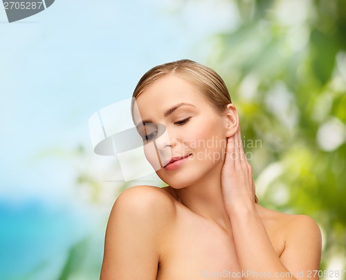 Image of face and hands of beautiful woman