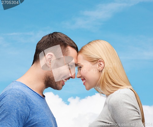 Image of smiling couple looking at each other