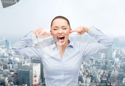 Image of angry screaming businesswoman