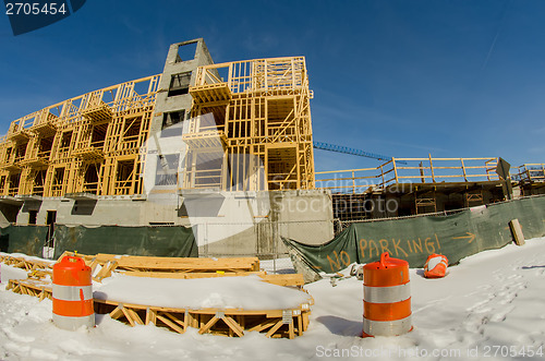 Image of wood stud construction with snow around