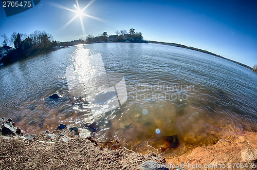 Image of sun shining over lake wylie in north carolina