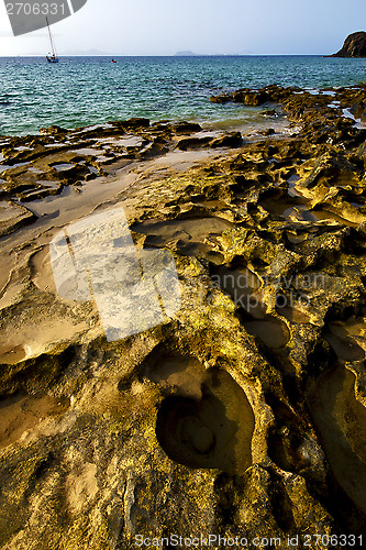 Image of rock beach  water   and summer in lanzarote spain