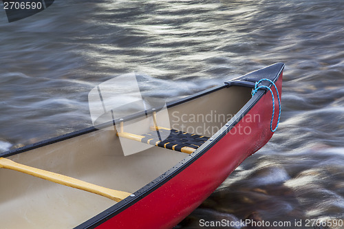 Image of red canoe bow