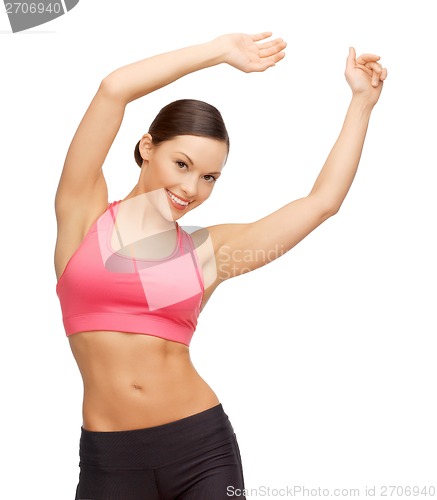 Image of beautiful asian sporty woman doing exercise