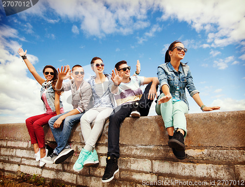 Image of group of teenagers hanging out