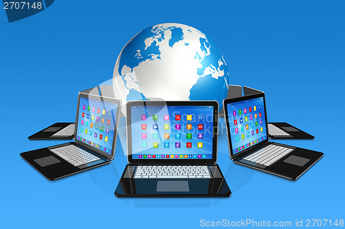 Image of Laptop Computers around World Globe