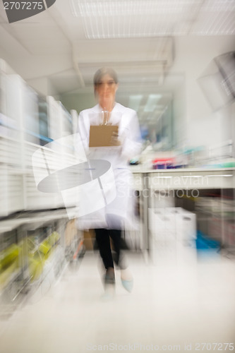 Image of Researcher Walking In Hospital