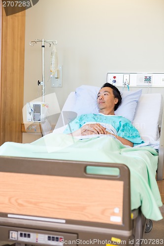 Image of Thoughtful Patient Lying On Bed In Hospital