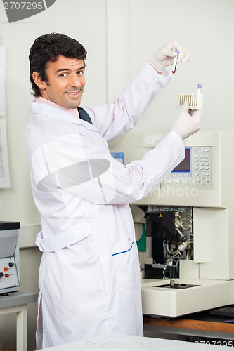 Image of Male Scientist Analyzing Blood Samples