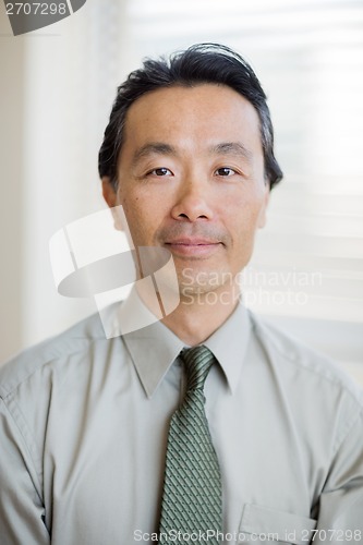 Image of Confident Cancer Specialist Smiling In Hospital