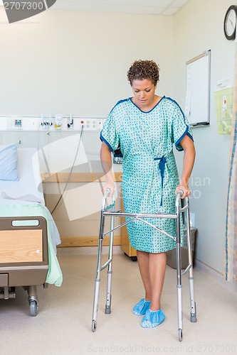 Image of Patient Walking With The Help Of Walker In Hospital