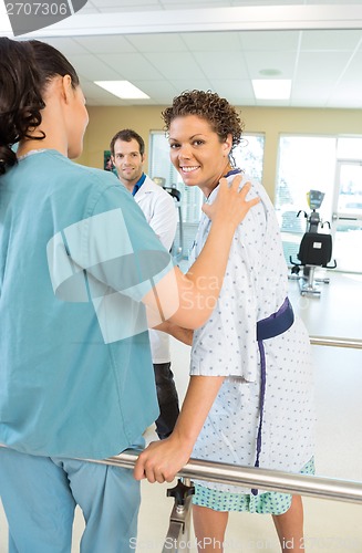 Image of Patient Being Assisted By Physical Therapist