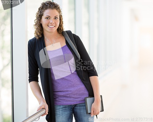 Image of Happy Female Student With Digital Tablet And Backpack