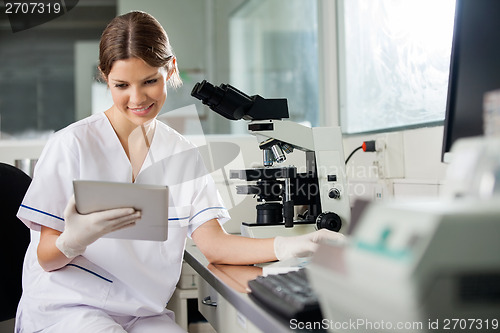 Image of Scientist Using Digital Tablet In Lab