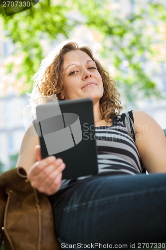 Image of Portrait Of University Student Holding Digital Tablet