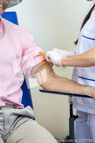 Image of Nurse Preparing Patient For Blood Test