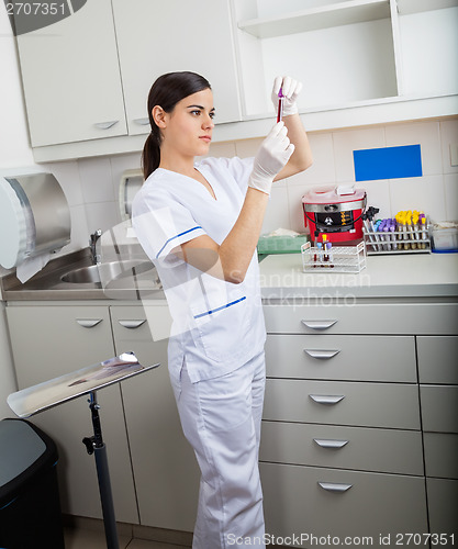 Image of Technician Analyzing Blood Sample