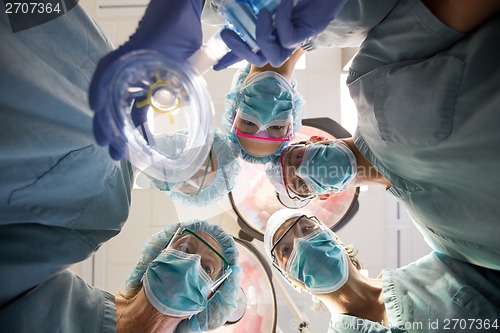 Image of Surgeons With Oxygen Mask In Operation Room