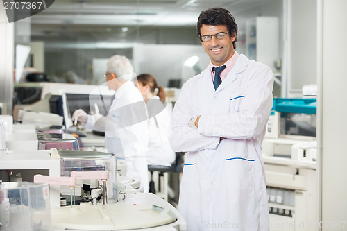Image of Researcher Standing Arms Crossed