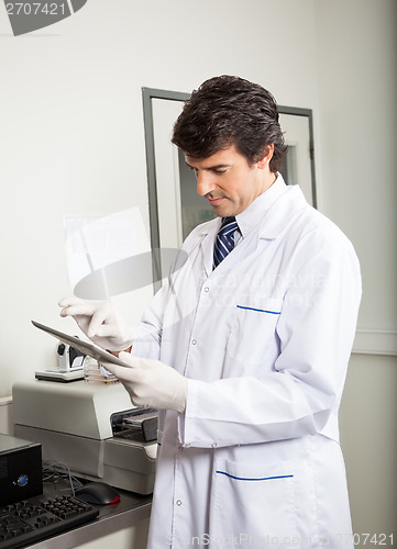 Image of Researcher Using Digital Tablet In Medical Lab