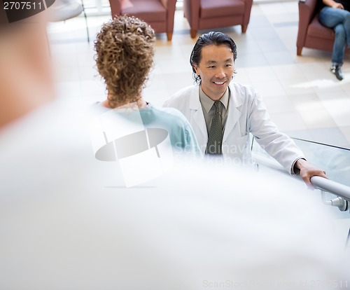 Image of Doctor And Nurse On Stairs