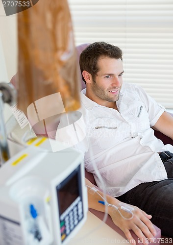 Image of IV Drip Attached To Patient's Hand