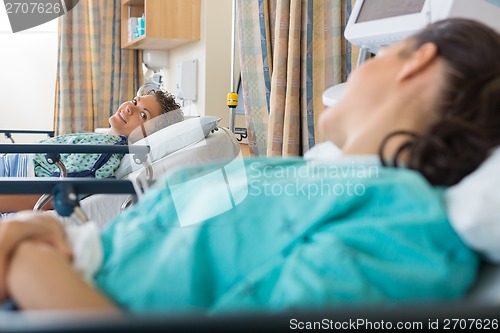 Image of Female Patient's Looking At Each Other In Ward