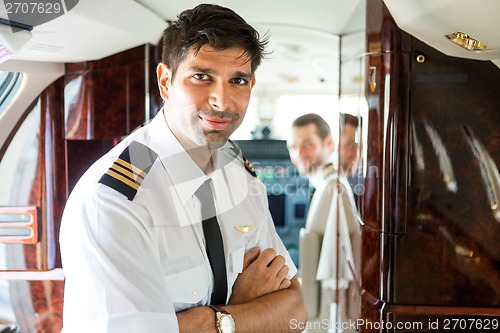 Image of Confident Pilot In Private Jet