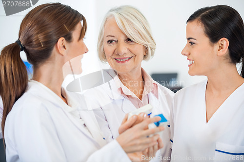 Image of Researchers Discussing Over Medicine