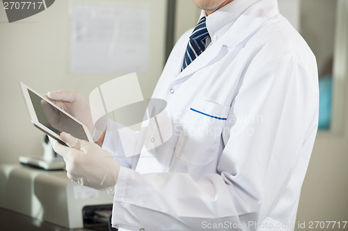 Image of Scientist Using Digital Tablet In Laboratory