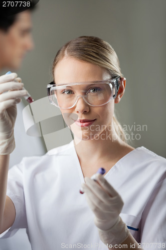 Image of Confident Lab Technician Analyzing Blood Samples