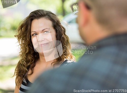 Image of Female University Student Looking At Male Friend