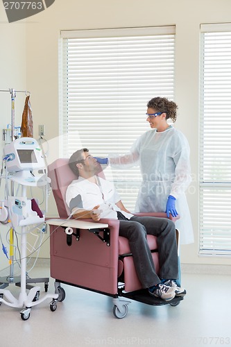 Image of Nurse and Chemo Patient Visiting